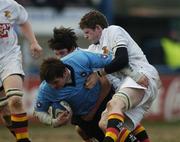 30 January 2006; Ian Leonard, St. Michael's College, is tackled by Michael Noone, right, and Sean Richardson, partially hidden, Presentation College Bray. Leinster Schools Senior Cup, First Round, Presentation College Bray v St. Michael's College, Donnybrook, Dublin. Picture credit; Pat Murphy / SPORTSFILE