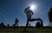 19 April 2014; Clontarf players run onto the pitch before the match. Ulster Bank League Division 1A, Clontarf v Ballynahinch, Castle Avenue, Clontarf, Dublin. Picture credit: Ramsey Cardy / SPORTSFILE