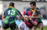 19 April 2014; Tony Ryan, Clontarf, is tackled by David McIlwaine, supported by Robin Harte, Ballynahinch. Ulster Bank League Division 1A, Clontarf v Ballynahinch, Castle Avenue, Clontarf, Dublin. Picture credit: Ramsey Cardy / SPORTSFILE
