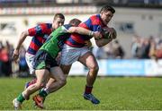 19 April 2014; Timmy McCoy, Clontarf, is tackled by Aaron Cairns, Ballynahinch. Ulster Bank League Division 1A, Clontarf v Ballynahinch, Castle Avenue, Clontarf, Dublin. Picture credit: Ramsey Cardy / SPORTSFILE