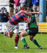 19 April 2014; Colm O'Shea, Clontarf, is tackled by Harry McAleese, Ballynahinch. Ulster Bank League Division 1A, Clontarf v Ballynahinch, Castle Avenue, Clontarf, Dublin. Picture credit: Ramsey Cardy / SPORTSFILE