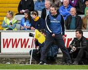 19 April 2014; Cavan manager Peter Reilly shows his frustration with a decision by referee Derek O'Mahony in the closing stages of the game. Cadbury GAA Football U21 Championship Semi-Final, Cavan v Dublin, O'Moore Park, Portlaoise, Co. Laois.  Picture credit: Brendan Moran / SPORTSFILE