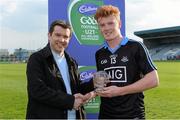 19 April 2014; Dublin's Conor McHugh is presented with the Man of the Match Award by Ray O'Mahony, Cadbury Ireland. Cadbury GAA Football U21 Championship Semi-Final, Cavan v Dublin, O'Moore Park, Portlaoise, Co. Laois.  Picture credit: Brendan Moran / SPORTSFILE