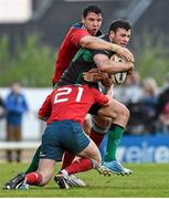 19 April 2014; Robbie Henshaw, Connacht, is tackled by Paddy Butler and Gerry Hurley, Munster. Celtic League 2013/14 Round 20, Connacht v Munster. The Sportsground, Galway. Picture credit: Diarmuid Greene / SPORTSFILE