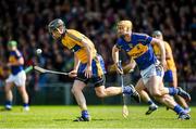 20 April 2014; Patrick Donnellan, Clare, clears under pressure from Séamus Callanan, Tipperary. Allianz Hurling League Division 1 semi-final, Clare v Tipperary, Gaelic Grounds, Limerick. Picture credit: Ray McManus / SPORTSFILE