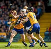20 April 2014; Niall O'Meara, Tipperary, in action against Cian Dillon, left, Shane O'Donnell and Patrick Donnellan, right, Clare. Allianz Hurling League Division 1 semi-final, Clare v Tipperary, Gaelic Grounds, Limerick. Picture credit: Ray McManus / SPORTSFILE