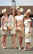21 April 2014; Amy Mullholland, left, Nicola McCamley, Trisha Heaney and Siofra Mageenis, all from Newry, Co. Down, enjoying a day at the races. Fairyhouse Easter Festival, Fairyhouse, Co. Meath. Picture credit: Barry Cregg / SPORTSFILE
