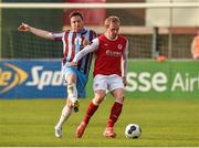 21 April 2014; Derek Foran, St Patrick's Athletic, in action against Philly Hughes, Drogheda United. Airtricity League Premier Division, Drogheda United v St Patrick's Athletic, United Park, Drogheda, Co. Louth. Photo by Sportsfile