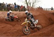 21 April 2014; Gary Gibson leads Matt Moffet during the second Expert MX1 race. Ulster Motocross Championship, Desertmartin Motocross Park, Co. Derry.  Picture credit: Ramsey Cardy / SPORTSFILE