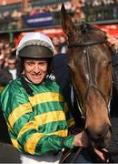 21 April 2014; Jockey Barry Geraghty with Shutthefrontdoor after winning the Boylesports Irish Grand National Steeplechase. Fairyhouse Easter Festival, Fairyhouse, Co. Meath. Picture credit: Brendan Moran / SPORTSFILE
