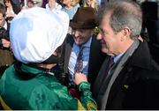 21 April 2014; Trainer Jonjo O'Neill, centre, with owner JP McManus, right, and jockey Barry Geraghty after Shutthefrontdoor won the Boylesports Irish Grand National Steeplechase. Fairyhouse Easter Festival, Fairyhouse, Co. Meath. Picture credit: Brendan Moran / SPORTSFILE