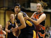 29 January 2006; Courtney McDaniel, UL Aughinish, in action against Orla Dempsey, DART Killester. Superleague Women's Cup Final, UL Aughinish v DART Killester, National Basketball Arena, Tallaght, Dublin. Picture credit: Brendan Moran / SPORTSFILE