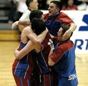 29 January 2006; UCC Demons players celebrate at the final buzzer. Superleague Men's Cup Final, UCC Demons v Limerick Lions, National Basketball Arena, Tallaght, Dublin. Picture credit: Brendan Moran / SPORTSFILE