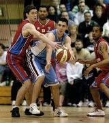 29 January 2006; Robert Lynch, Limerick Lions, in action against Colin O'Reilly, left, and Gary Johnson, UCC Demons. Superleague Men's Cup Final, UCC Demons v Limerick Lions, National Basketball Arena, Tallaght, Dublin. Picture credit: Brendan Moran / SPORTSFILE