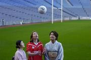 30 January 2006; Cork footballer Rena Buckley, with wives of Japanese Diplomats, Mrs Midori Yoshida, left, and Mrs Namiko Tominaga at the launch of the 2006 Suzuki Ladies' National Football League. Croke Park, Dublin. Picture credit: Brendan Moran / SPORTSFILE