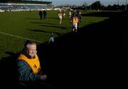 29 January 2006; A steward looks on as the Wexford team makes their way onto the pitch. Walsh Cup, Dublin v Wexford, Parnell Park, Dublin. Picture credit: Brian Lawless / SPORTSFILE