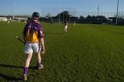 29 January 2006; Wexford's Darren Stamp makes his way onto the pitch to warm up. Walsh Cup, Dublin v Wexford, Parnell Park, Dublin. Picture credit: Brian Lawless / SPORTSFILE
