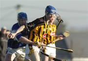 29 January 2006; Seaghain O'Neill, Kilkenny, in action against Pat Mahon, Laois. Walsh Cup, Laois v Kilkenny, Kelly Daly Park, Rathdowney, Co. Laois. Picture credit: Damien Eagers / SPORTSFILE