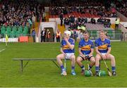 20 April 2014; Tipperary players Brendan Maher, James Barry and Noel McGrath await the arrival of their team mates for the traditional team photograph before the game. Allianz Hurling League Division 1 semi-final, Clare v Tipperary, Gaelic Grounds, Limerick. Picture credit: Ray McManus / SPORTSFILE
