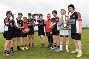 22 April 2014; Players from the U12 Cill Dara rugby club, from left, Lee Burke, Oisin Michel, Luke McCann, Luke O'Toole, Brian Berney, Aaron Nolan, Max ByrneDaragh Searing and Brandon Fitzsimmons, with the RaboDirect Pro 12 trophy, the Amlin Cup and the British and Irish Cup, during the Leinster School of Excellence tour in Cill Dara Rugby Football Club, Co. Kildare. Picture credit: David Maher / SPORTSFILE