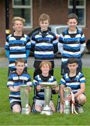 23 April 2014; Members of Wanderers RFC with the British & Irish Cup, Almlin Cup and Celtic League trophies during the Leinster School of Excellence on tour in Wanderers RFC, Merrion Road, Ballsbridge, Dublin. Picture credit: Ramsey Cardy / SPORTSFILE