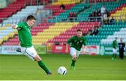24 April 2014; Ryan Manning, Republic of Ireland U18 Schools, shoots to score his side's first goal from the penalty spot. Centenary Shield, Republic of Ireland U18 Schools v Scotland U18 Schools, Tallaght Stadium, Tallaght, Dublin. Picture credit: Tómas Greally / SPORTSFILE