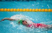 24 April 2014; Emma Cassidy, Sunday's Well swimming club, on her way to winning her semi-final of the Women's 100m Backstroke at the 2014 Irish Long Course National Championships. National Aquatic Centre, Abbotstown, Dublin. Picture credit: Brendan Moran / SPORTSFILE