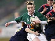 4 February 2006; Lynne Cantwell, Ireland, is tackled by Montserrat Poza, Spain. Women's Six Nations 2005-2006, Ireland v Spain, Donnybrook, Dublin. Picture credit; Brian Lawless / SPORTSFILE