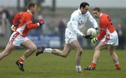 5 February 2006; Dermot Earley, Kildare, in action against Kieran McGeeney, right and Tony McEntee, Armagh. Allianz National Football League, Division 1B, Round 1, Armagh v Kildare, St. Oliver Plunkett Park, Crossmaglen, Co. Armagh. Picture credit: Damien Eagers / SPORTSFILE