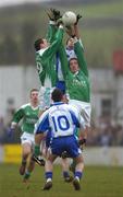 5 February 2006; Paul Finlay, Monaghan, supported by team-mate Stephen Gollogly, 10, in action against James Sherry, left, and Mark Murphy, Fermanagh. Allianz National Football League, Division 1A, Round 1, Monaghan v Fermanagh, O'Neill Park, Clontibret, Co. Monaghan. Picture credit: Pat Murphy / SPORTSFILE
