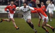 5 February 2006; Dermot Earley, Kildare, in action against Stephen Kernan, Armagh. Allianz National Football League, Division 1B, Round 1, Armagh v Kildare, St. Oliver Plunkett Park, Crossmaglen, Co. Armagh. Picture credit: Damien Eagers / SPORTSFILE
