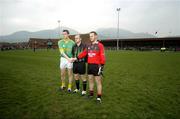 5 February 2006; Team captains Nigel Crawford, Meath, and Brendan Coulter, Down, shakes hands in the company of Referee Frank Flynn before the game. Allianz National Football League, Division 1B, Round 1, Down v Meath, St. Patrick's Park, Newcastle, Co. Down. Picture credit: Brendan Moran / SPORTSFILE