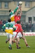 5 February 2006; Alan McNamee, Offaly, in action against Dermot Hurley, Cork. Allianz National Football League, Division 1A, Round 1, Offaly v Cork, O'Connor Park, Tullamore, Co. Offaly. Picture credit: Ray McManus / SPORTSFILE
