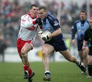 5 February 2006; Ciaran Whelan, Dublin, in action against Colin Holmes, Tyrone. Allianz National Football League, Division 1A, Round 1, Tyrone v Dublin, Healy Park, Omagh, Co. Tyrone. Picture credit: Oliver McVeigh / SPORTSFILE
