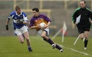 5 February 2006; John Hegarty, Wexford, in action against Paul McDonald, Laois. Allianz National Football League, Division 1B, Round 1, Laois v Wexford, O'Moore Park, Portlaoise, Co. Laois. Picture credit: Brian Lawless / SPORTSFILE
