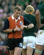 13 November 2004; Referee Paul Honiss puts away his yellow card after showing it to Schalk Burker, South Africa. Rugby International, Ireland v South Africa, Lansdowne Road, Dublin. Picture credit; Brendan Moran / SPORTSFILE