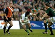 13 November 2004; Johnny O'Connor, Ireland, in action against John &quot;Bakkies&quot; Botha, South Africa, watched by referee Paul Honiss. Rugby International, Ireland v South Africa, Lansdowne Road, Dublin. Picture credit; Brendan Moran / SPORTSFILE