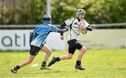 24 April 2014; Ciaran McCarrick is tackled by Mark Coen during the Leinster School of Excellence on tour in Navan RFC, Navan, Co. Meath. Picture credit: Stephen McCarthy / SPORTSFILE
