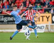 25 April 2014; Patrick McEleney, Derry City, in action against Colm Crowe, UCD. Airtricity League Premier Division, Derry City v UCD, Brandywell, Derry. Picture credit: Oliver McVeigh / SPORTSFILE