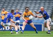 26 April 2014; Martin O'Leary, Clare, in action against Peter Acheson, left, and Andrew Morris, Tipperary. Allianz Football League Division 4 Final, Tipperary v Clare, Croke Park, Dublin. Picture credit: Barry Cregg / SPORTSFILE