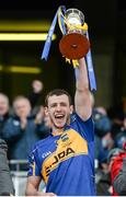 26 April 2014; Tipperary captain Paddy Codd, lifts the cup. Allianz Football League Division 4 Final, Tipperary v Clare, Croke Park, Dublin. Picture credit: Barry Cregg / SPORTSFILE