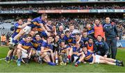 26 April 2014;  The Tipperary team celebrate victory with the cup after the game. Allianz Football League Division 4 Final, Tipperary v Clare, Croke Park, Dublin. Picture credit: Barry Cregg / SPORTSFILE