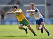 27 April 2014; Ryan McHugh, Donegal, in action against Paudie McKenna, Monaghan. Allianz Football League Division 2 Final, Donegal v Monaghan, Croke Park, Dublin. Picture credit: David Maher / SPORTSFILE
