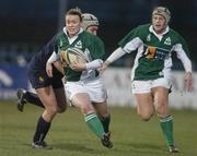 4 February 2006; Lynne Cantwell, Ireland, is tackled by Angelina Masdeu, Spain. Women's Six Nations 2005-2006, Ireland v Spain, Donnybrook, Dublin. Picture credit; Brian Lawless / SPORTSFILE