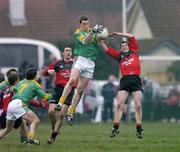 5 February 2006; Nigel Crawford, Meath, fields a high ball ahead of Paul Murphy, Down. Allianz National Football League, Division 1B, Round 1, Down v Meath, St. Patrick's Park, Newcastle, Co. Down. Picture credit: Brendan Moran / SPORTSFILE