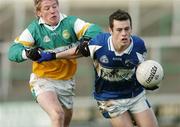 22 January 2006; Padraig McMahon, Laois, in action against Sean Ryan, Offaly. O'Byrne Cup, Semi-Final, Laois v Offaly, O'Moore Park, Portlaoise, Co. Laois. Picture credit: David Maher / SPORTSFILE
