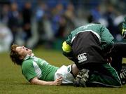 11 February 2006; Ireland captain Brian O'Driscoll screams in pain while being attended to by physio Cameron Steele. RBS 6 Nations 2006, France v Ireland, Stade de France, Paris, France. Picture credit; Brendan Moran / SPORTSFILE