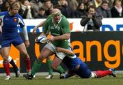 11 February 2006; John Hayes, Ireland, is tackled by Pieter De Villiers, France. RBS 6 Nations 2006, France v Ireland, Stade de France, Paris, France. Picture credit; Matt Browne / SPORTSFILE