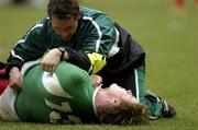 11 February 2006; Brian O'Driscoll, Ireland, receives treatment from team  physio Cameron Steele. RBS 6 Nations 2006, France v Ireland, Stade de France, Paris, France. Picture credit; Matt Browne / SPORTSFILE