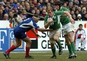 11 February 2006; Paul O'Connell, Ireland, is tackled by Pieter De Villiers, France. RBS 6 Nations 2006, France v Ireland, Stade de France, Paris, France. Picture credit; Matt Browne / SPORTSFILE